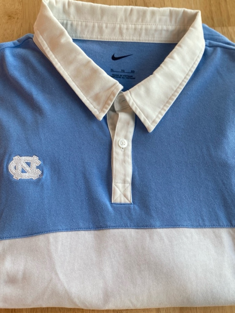 Nike Men’s Carolina Blue and White Polo with Embroidered UNC Logo